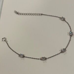 Sterling silver moissanite station bracelet